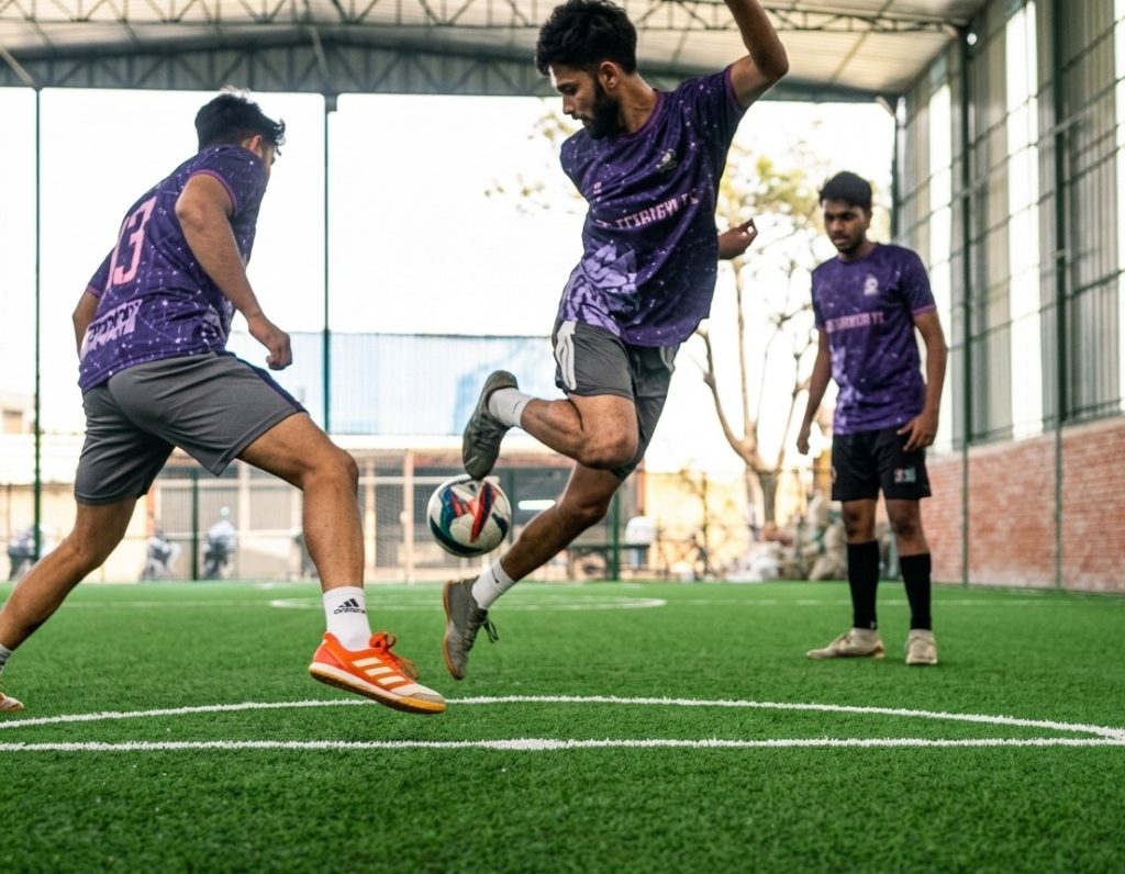A dynamic action shot on an indoor Nexora Structure turf Football Field.
